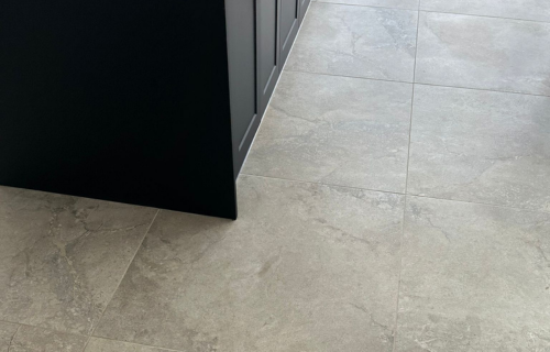 "Dirt Busters team polishing hard floors, ensuring a shiny finish with eco-friendly cleaning solutions."